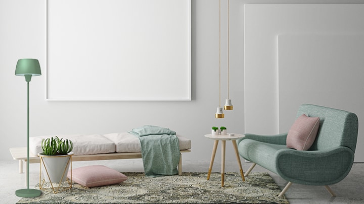 Floor lamp lighting a couch